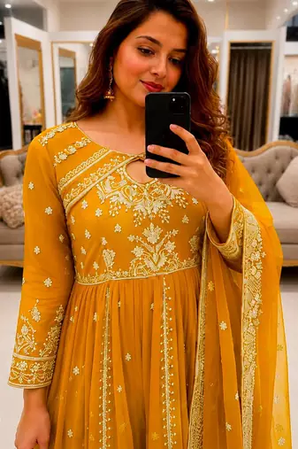 Yellow faux georgette sequins  free size flared gown set