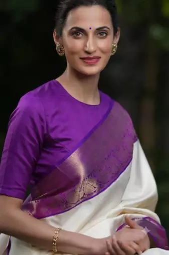 Purple art silk woven saree with zari work