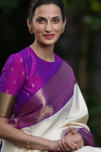 Purple art silk woven saree with zari work