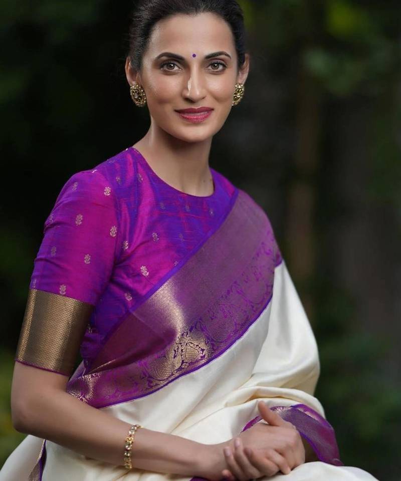 Purple art silk woven saree with zari work