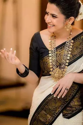 White art silk woven saree with zari work