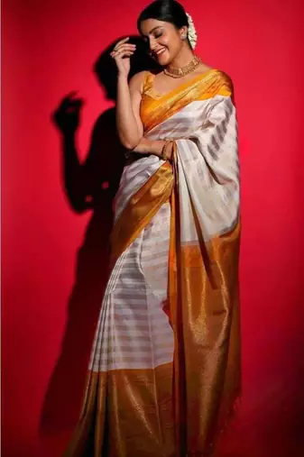 Off white art silk woven saree with zari work