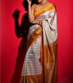 Off white art silk woven saree with zari work