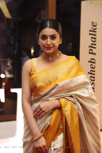 Off white art silk woven saree with zari work