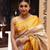 Off white art silk woven saree with zari work