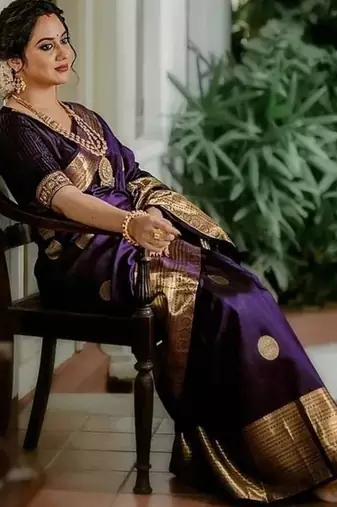Purple art silk woven saree with zari work