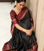 Black art silk woven saree with zari work