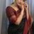 Black art silk woven saree with zari work