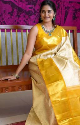 Light yellow art silk woven saree with zari work 1