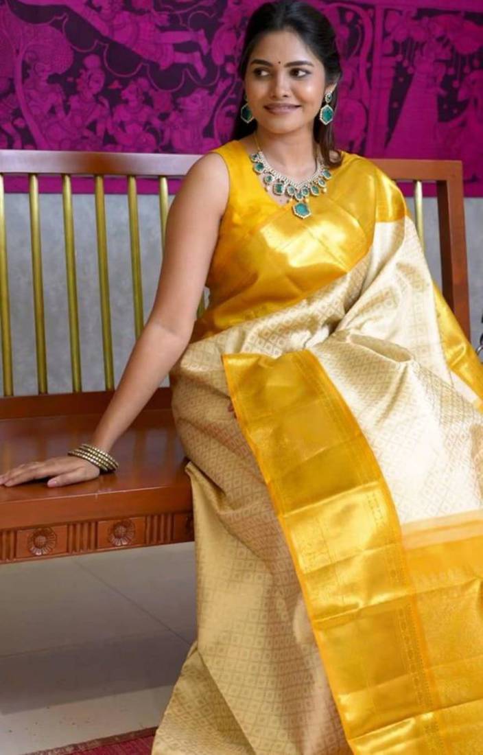 Light yellow art silk woven saree with zari work