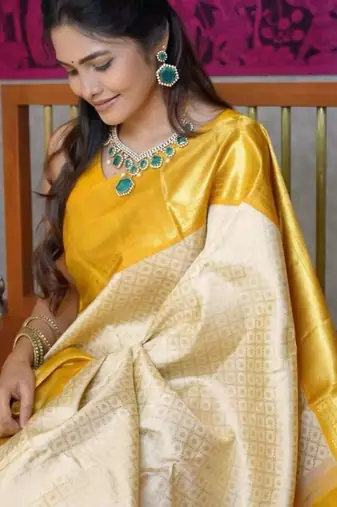 Light yellow art silk woven saree with zari work