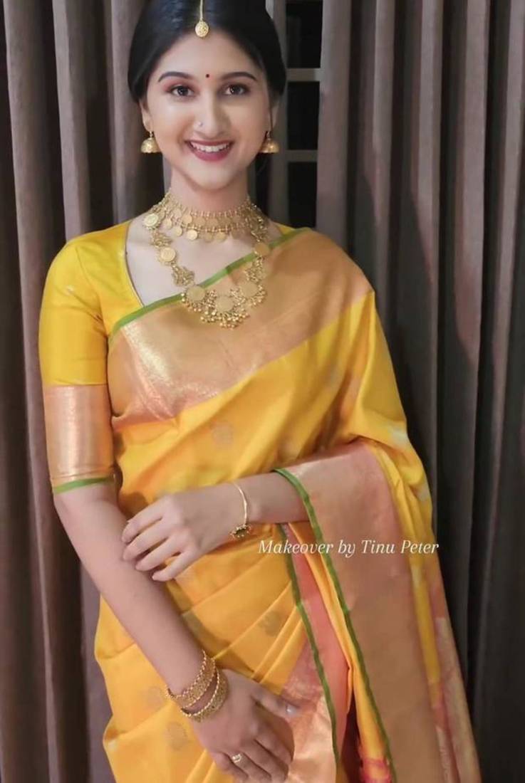 Yellow art silk woven saree with zari work