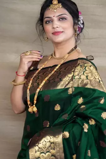 Green art silk woven saree with zari work
