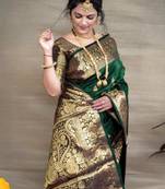 Green art silk woven saree with zari work