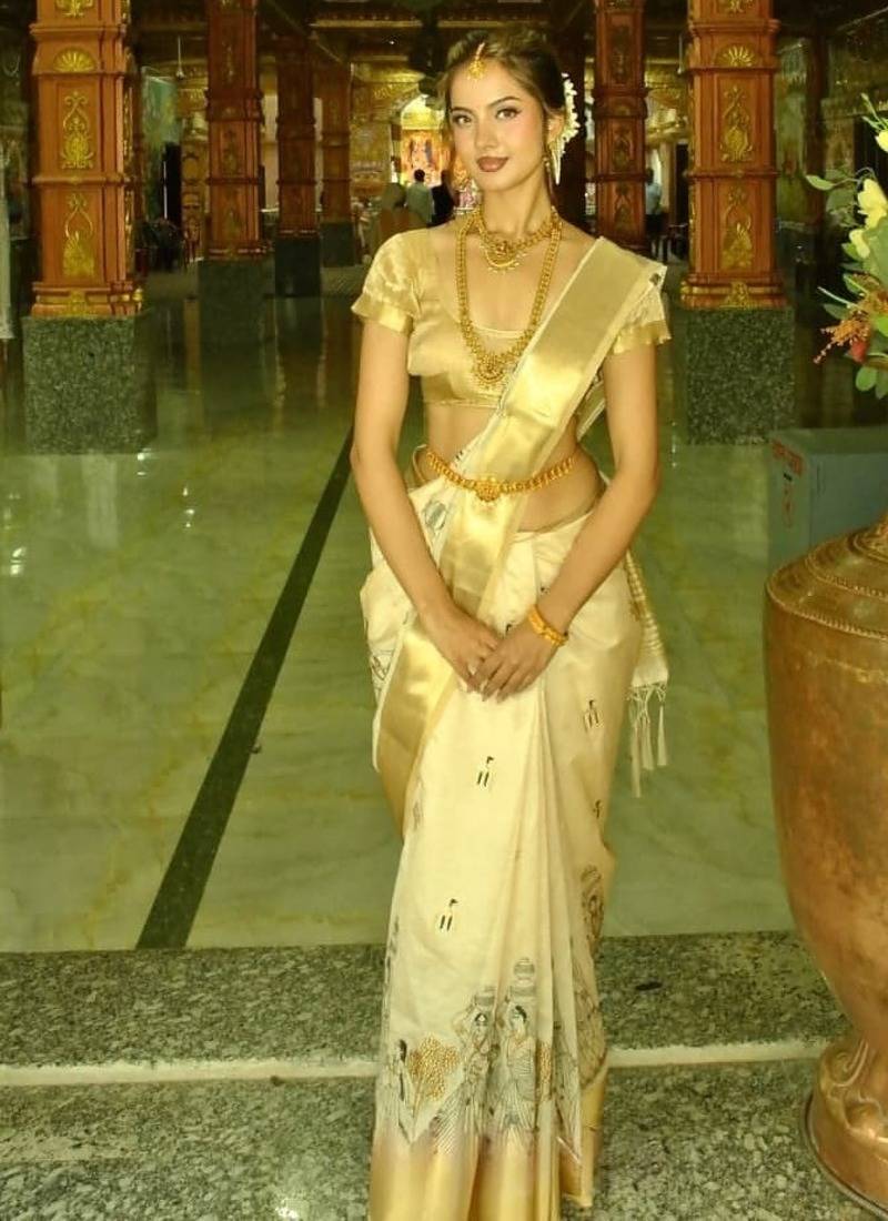 Ivory tusser silkblend saree with designer weaving border & embroidered kalamkari design