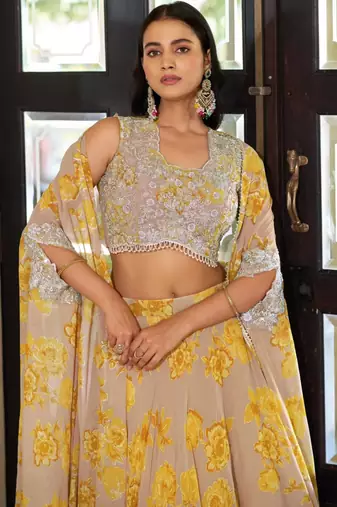 yellow georgette embroidered traditional lehenga-choli with free size upto 42