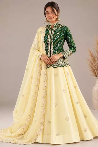 cream silk blend embroidered traditional lehenga-choli with free size upto 44