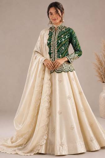 cream silk blend embroidered traditional lehenga-choli with free size upto 44