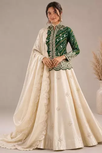 cream silk blend embroidered traditional lehenga-choli with free size upto 44