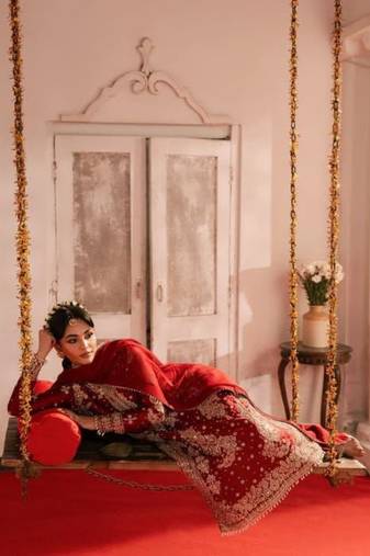 Red roman silk blend embroidered palazzo suit set with faux georgette dupatta