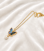 Butterfly pendant necklace with abalone shell and pearl drop