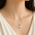 Mermaid tail pearl pendant necklace, gold-tone chain