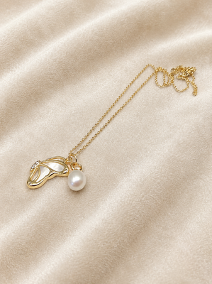 Gold-tone pearl pendant necklace with shell charm and crystal 1