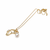 Gold-tone pearl pendant necklace with shell charm and crystal