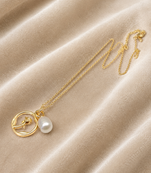 Gold-tone rose charm and freshwater pearl pendant necklace