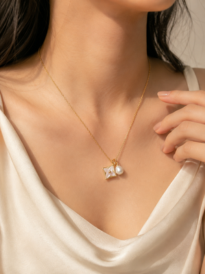 Gold-tone flower charm and pearl pendant necklace 2