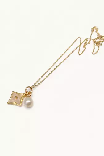 Gold-tone flower charm and pearl pendant necklace