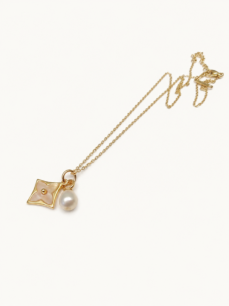 Gold-tone flower charm and pearl pendant necklace