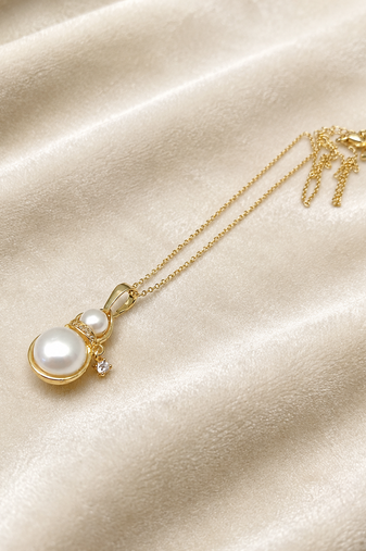 Double pearl pendant necklace with crystal charm, gold-tone