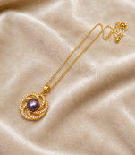 Purple freshwater pearl pendant necklace with gold-tone chain