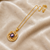 Purple freshwater pearl pendant necklace with gold-tone chain