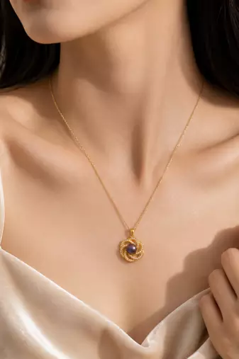 Purple freshwater pearl pendant necklace with gold-tone chain