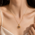 Purple freshwater pearl pendant necklace with gold-tone chain