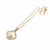 Gold-tone clover pearl pendant necklace with crystal accents