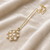 Pearl cluster pendant necklace with gold-tone chain