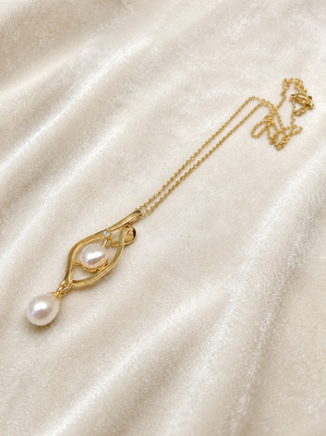 Double pearl pendant necklace with gold-tone chain 1