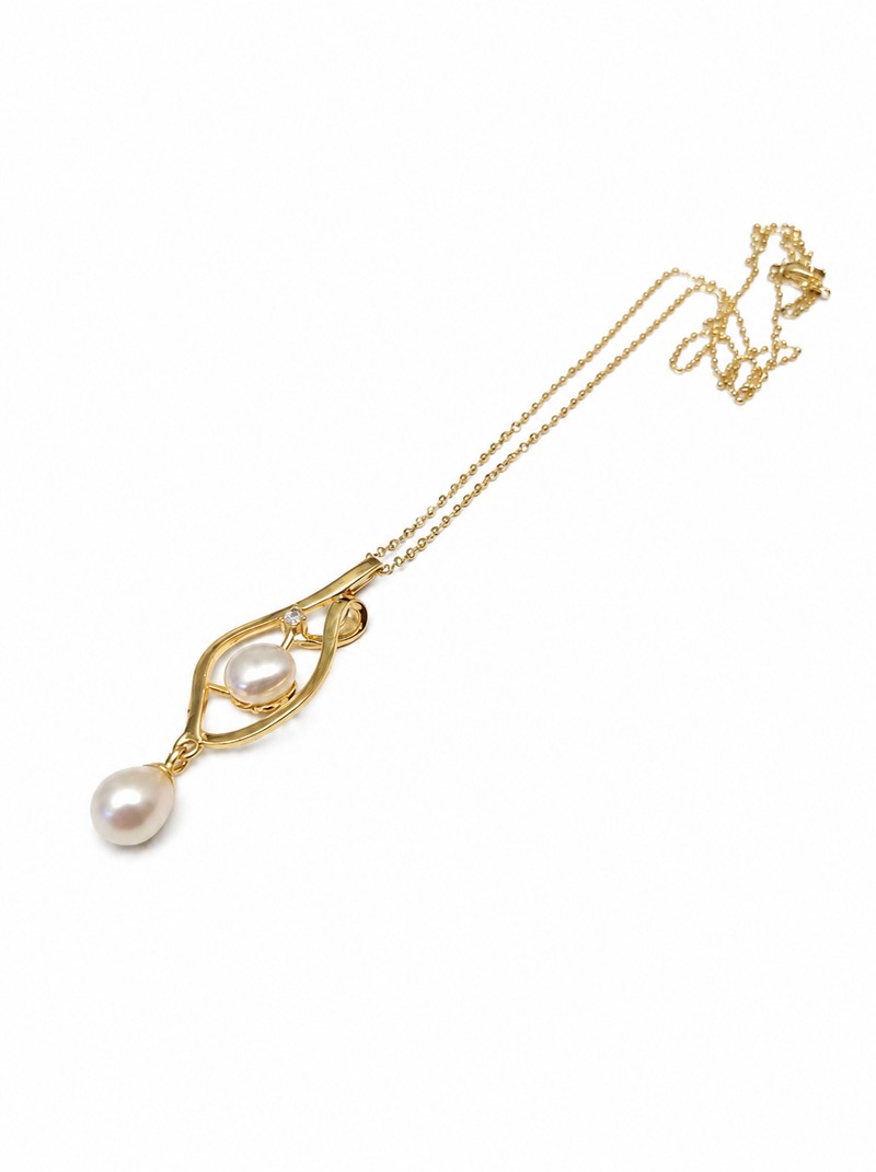 Double pearl pendant necklace with gold-tone chain