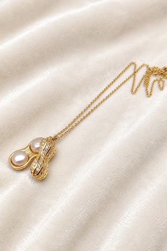 Pearl & crystal peanut shape pendant necklace, gold tone