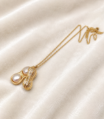 Pearl & crystal peanut shape pendant necklace, gold tone