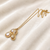 Pearl & crystal peanut shape pendant necklace, gold tone