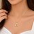 Pearl & crystal peanut shape pendant necklace, gold tone