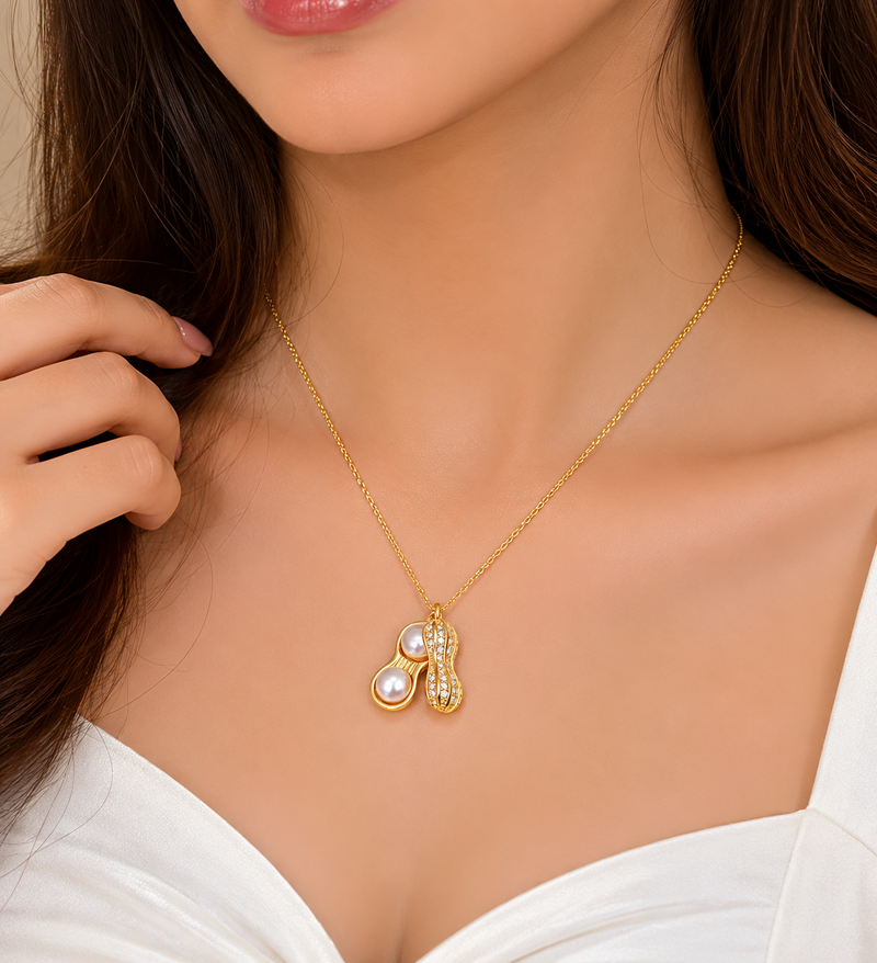 Pearl & crystal peanut shape pendant necklace, gold tone