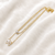 Layered gold chain necklace with pearl and crystal flower
