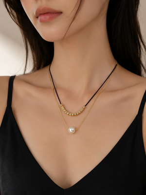 Layered pearl pendant necklace with black cord and gold chain 2