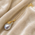 Baroque pearl pendant necklace with gold-tone chain