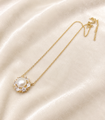 Pearl pendant necklace with crystal halo, gold-tone chain